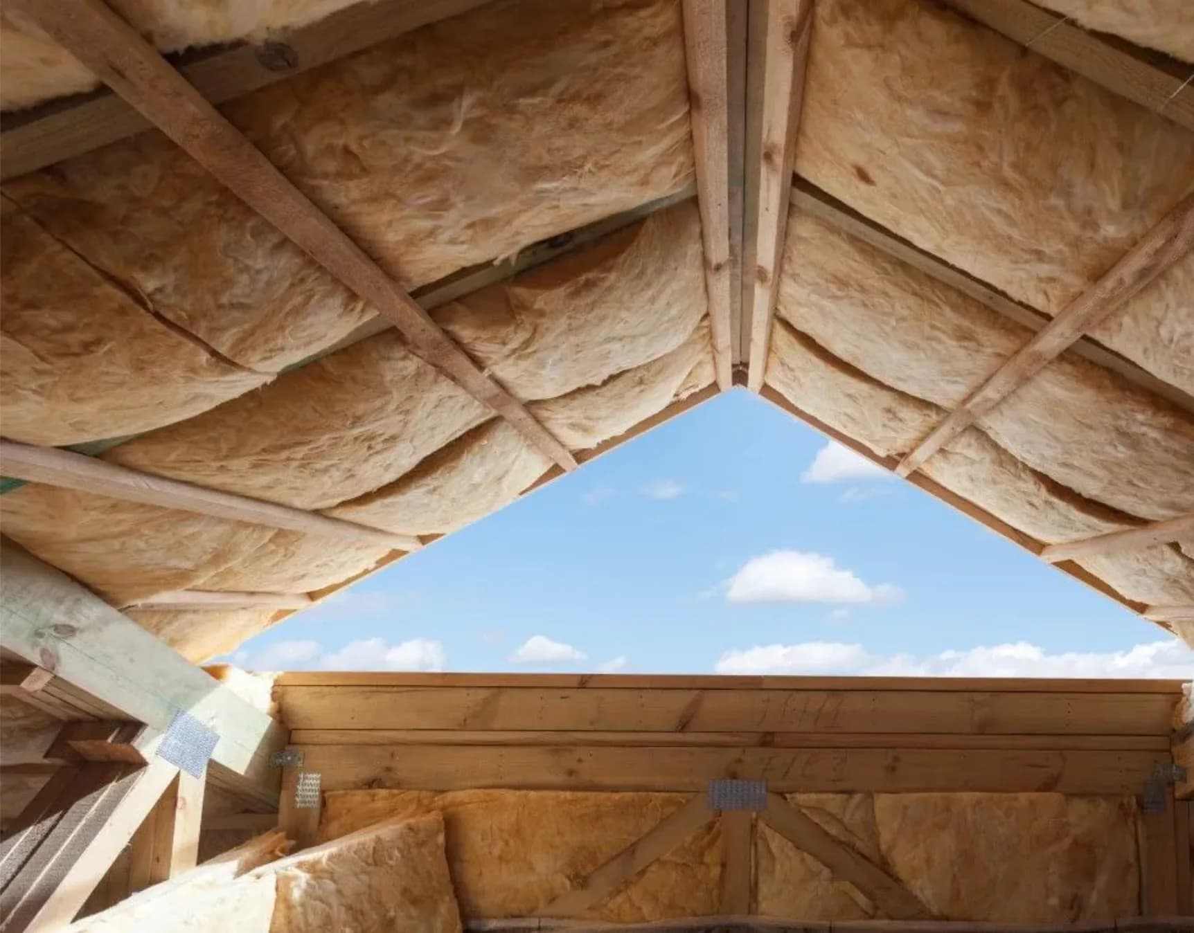 Roofline attic insulation Roofline insulation installed between rafters under open sky