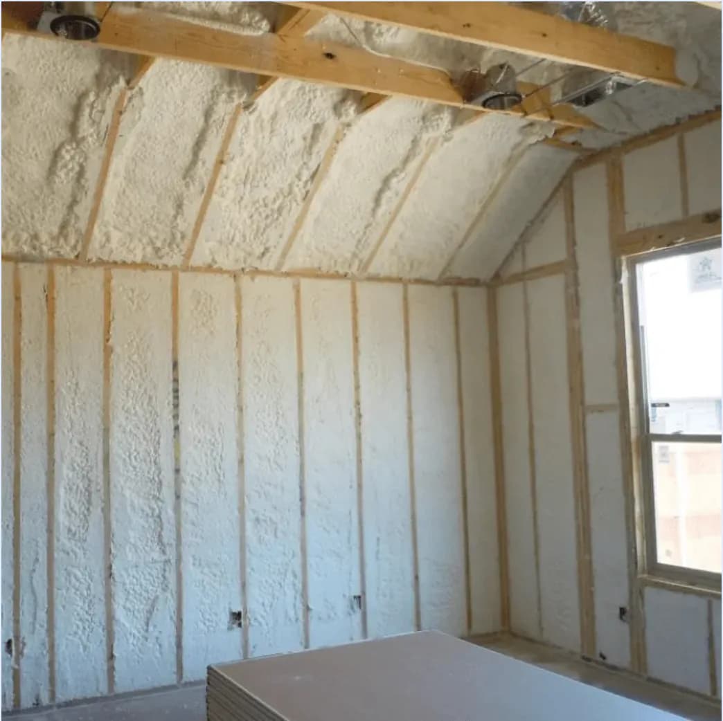 Spray foam insulated room framing Spray foam insulation installed between wall studs and roof framing